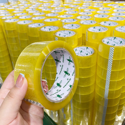 Un bon prix. Fabrique sur mesure BOPP jaune jaune jaune de l'emballage du ruban adhésif d'étanchéité en ligne